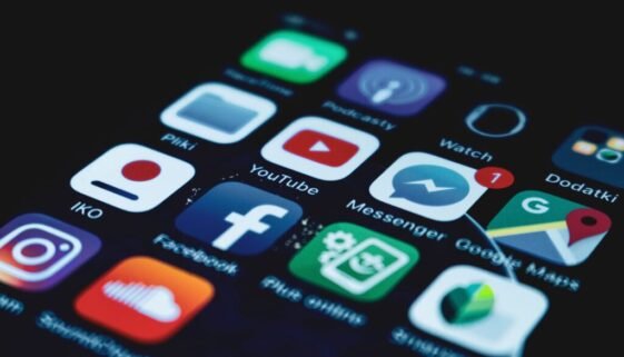 Business comparing organic social media and paid social advertising strategies